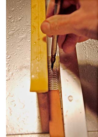 Pushing PCB through saw